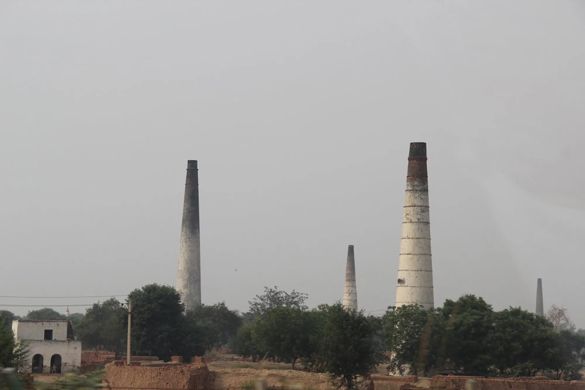 Brick kiln chimneys on the horizon (placeholder image)