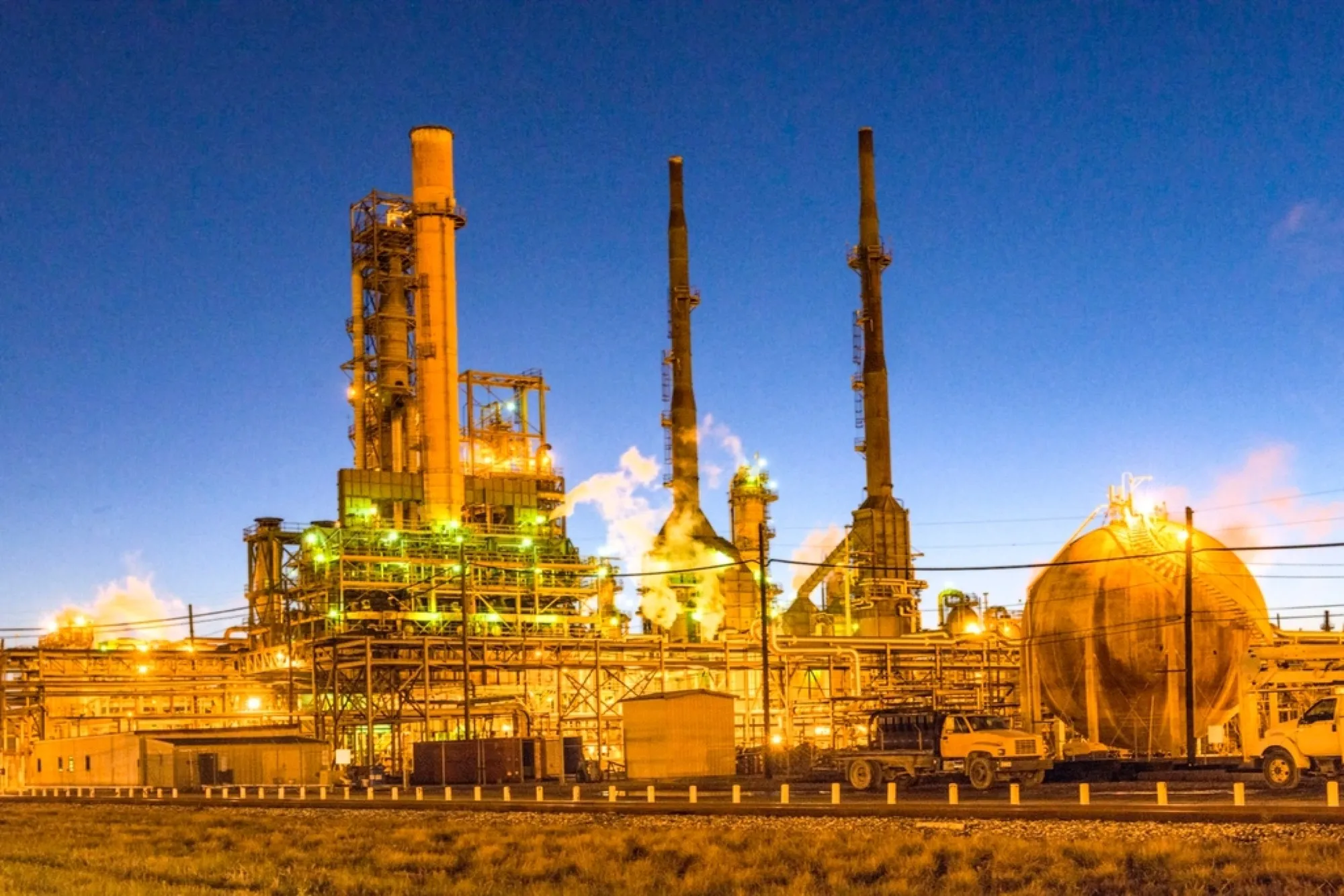 Industrial processing plant with towers and pipework (placeholder image)