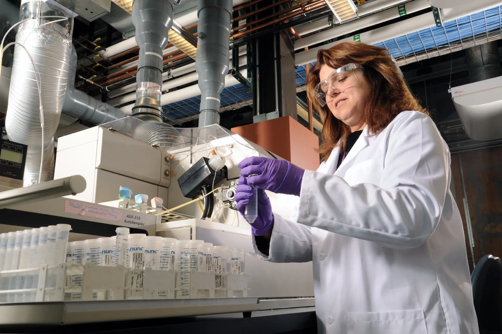 Technician analysing samples in a laboratory (placeholder image)